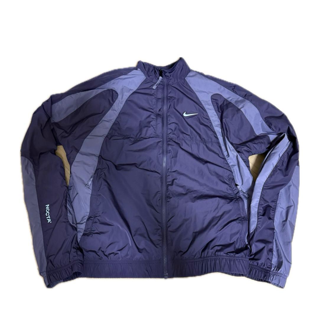 NIKE NOCTA ナイロンジャケット 紫 NOCTA Mens Track Jacket – Extra Butter